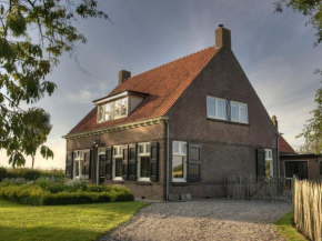 Spacious Farmhouse in IJzendijke with Garden